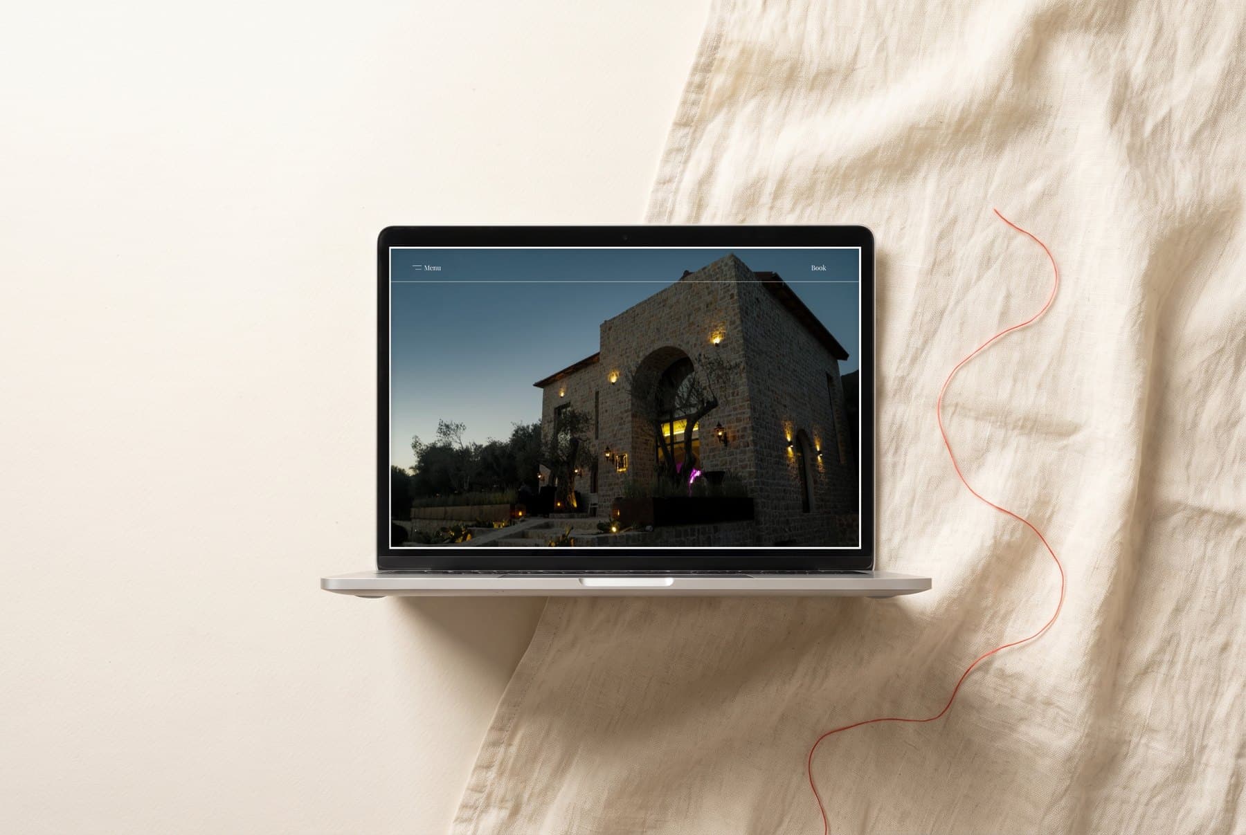 Mashtra, The Olive House website on a laptop